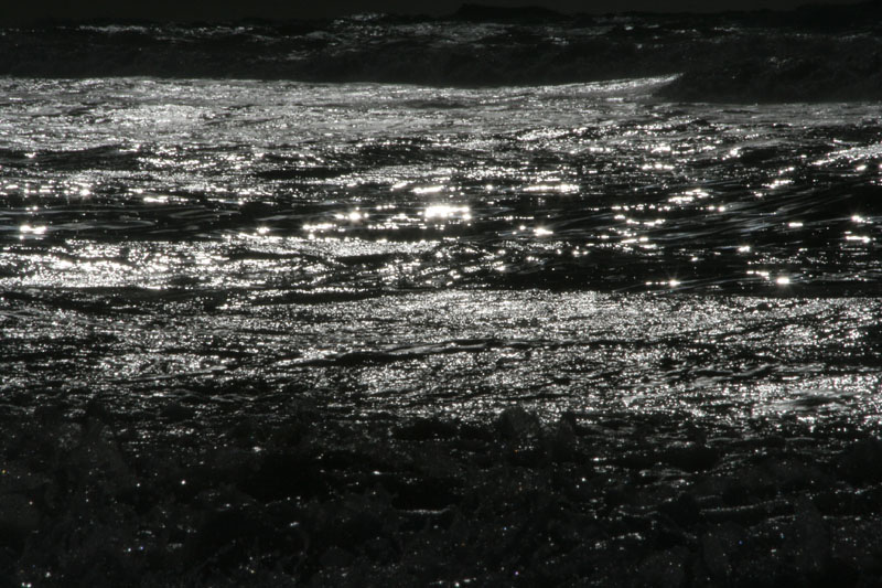 De zee bij Wassenaarse slag - weerspiegeling van de zon