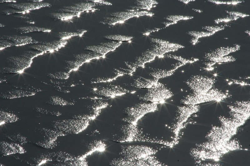 Vlieland, reflecties van het zonlicht op het strand